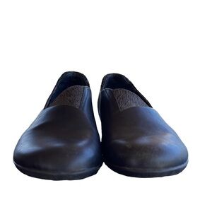 AHNU Black Leather Tola Slip Ons